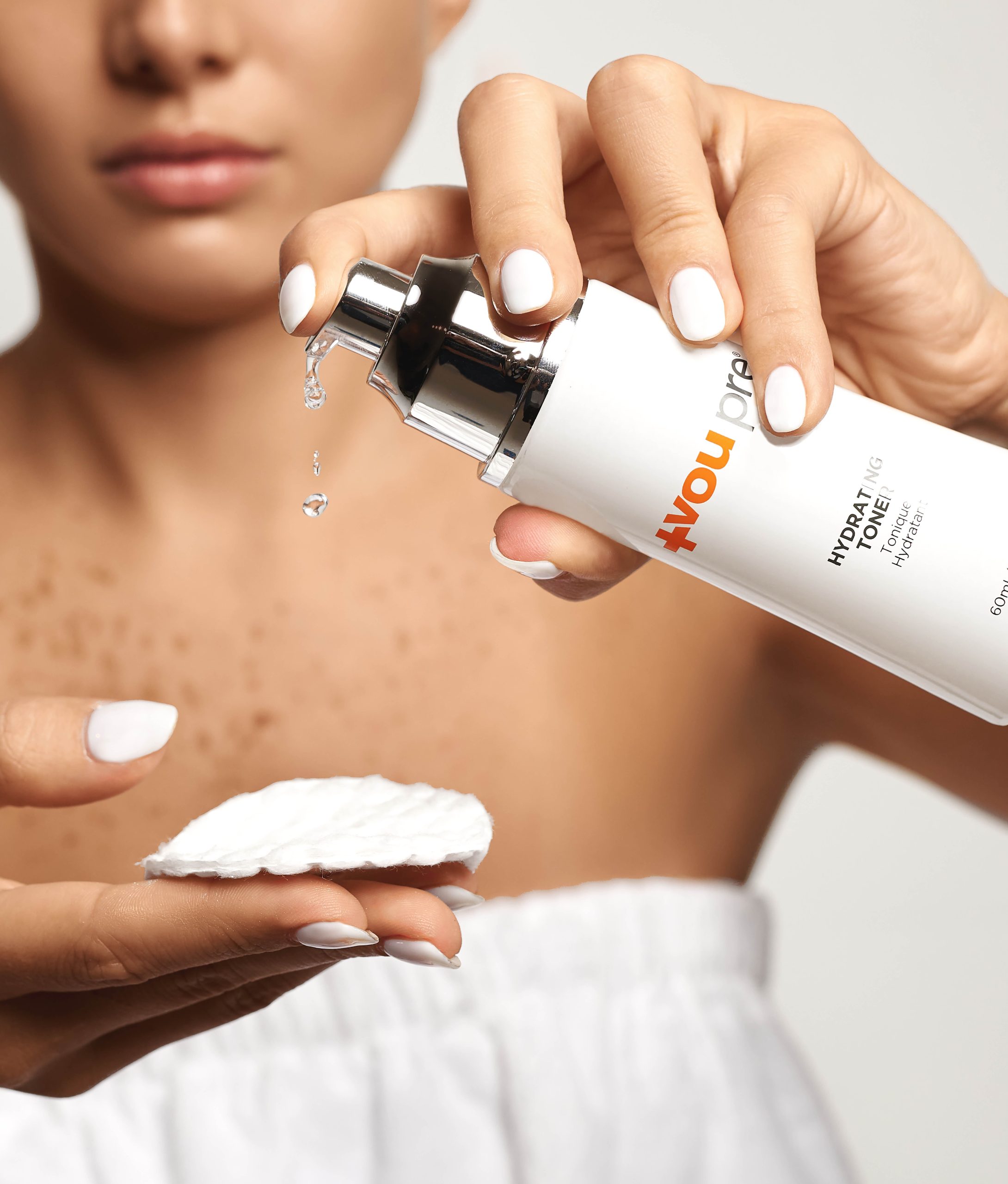 Woman using VouPre toner