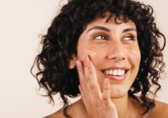 Woman learning how peeling gel works for exfoliation