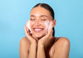 woman washing face