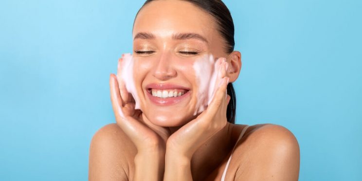 woman washing face